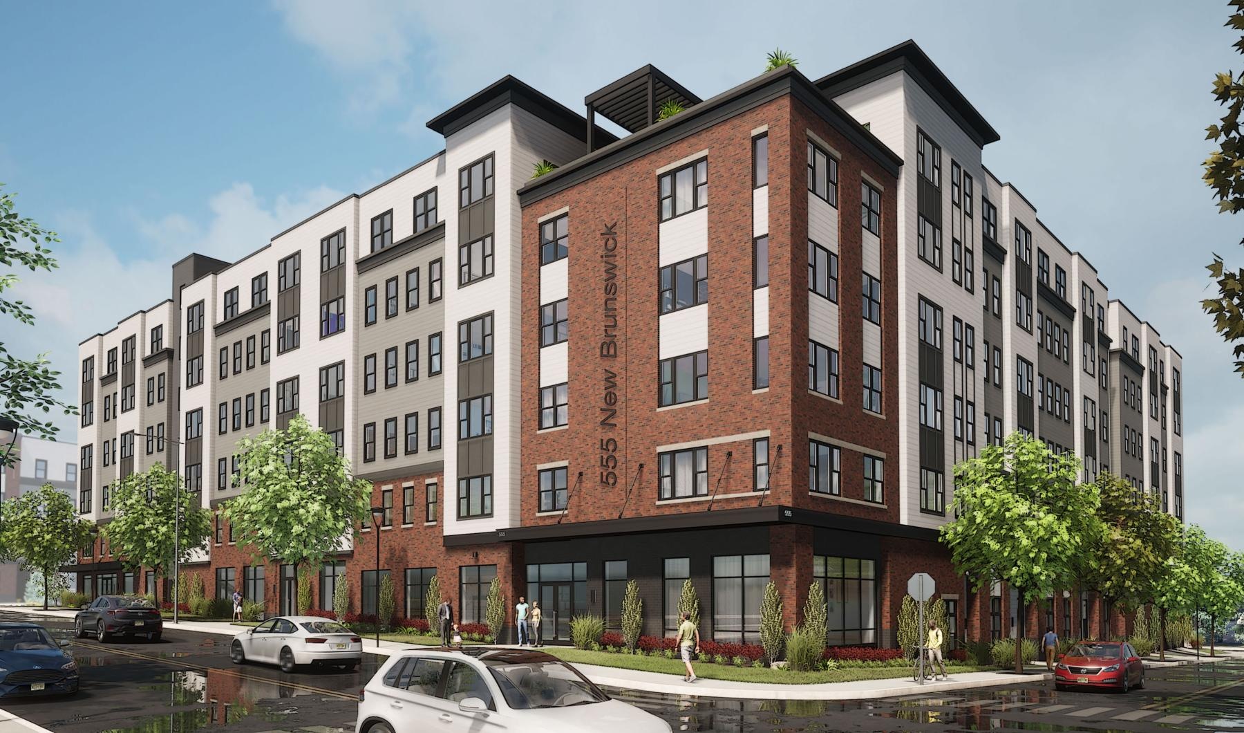 a large brick building with cars parked in front of it