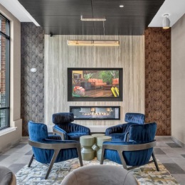 a lounge room with a tv