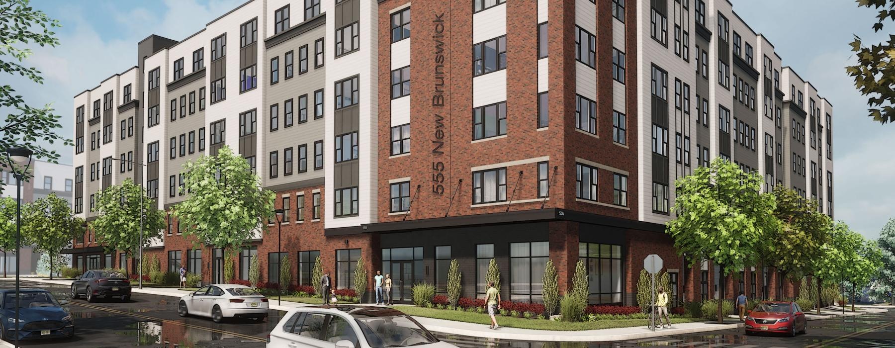 a large brick building with cars parked in front of it