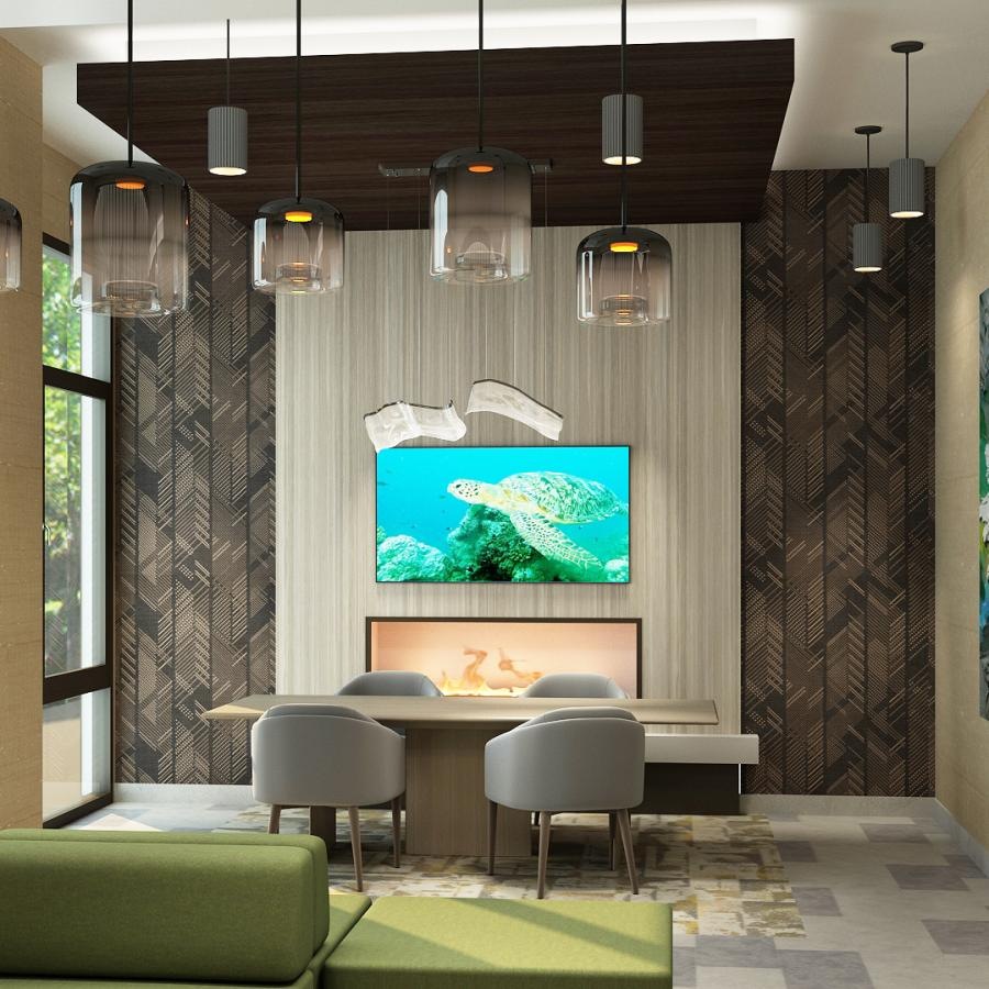 a room with a tv, table and chairs